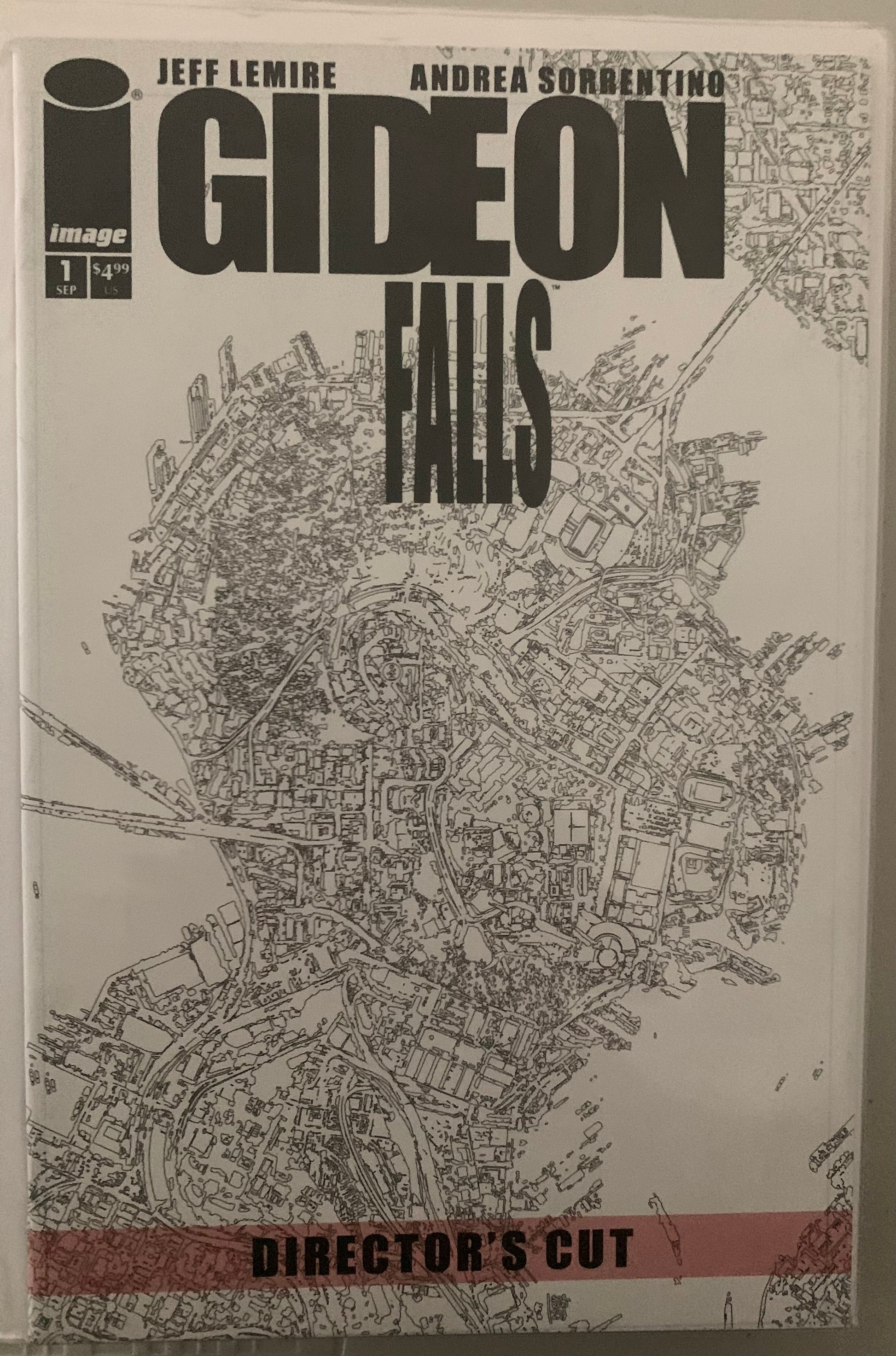 Comic book cover of 'Gideon Falls' with a map illustration in the shape of a person's head and shoulders on the cover.