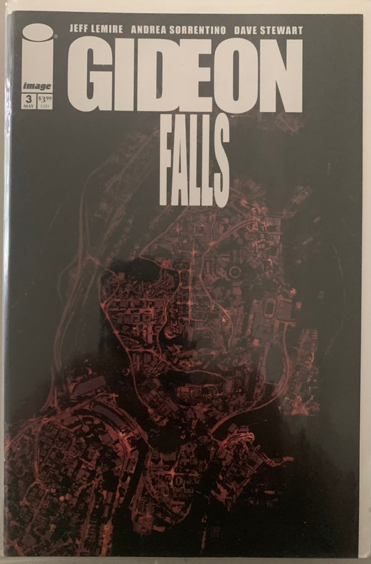 Comic book cover of 'Gideon Falls' with a map in the shape of a female head on a dark background.