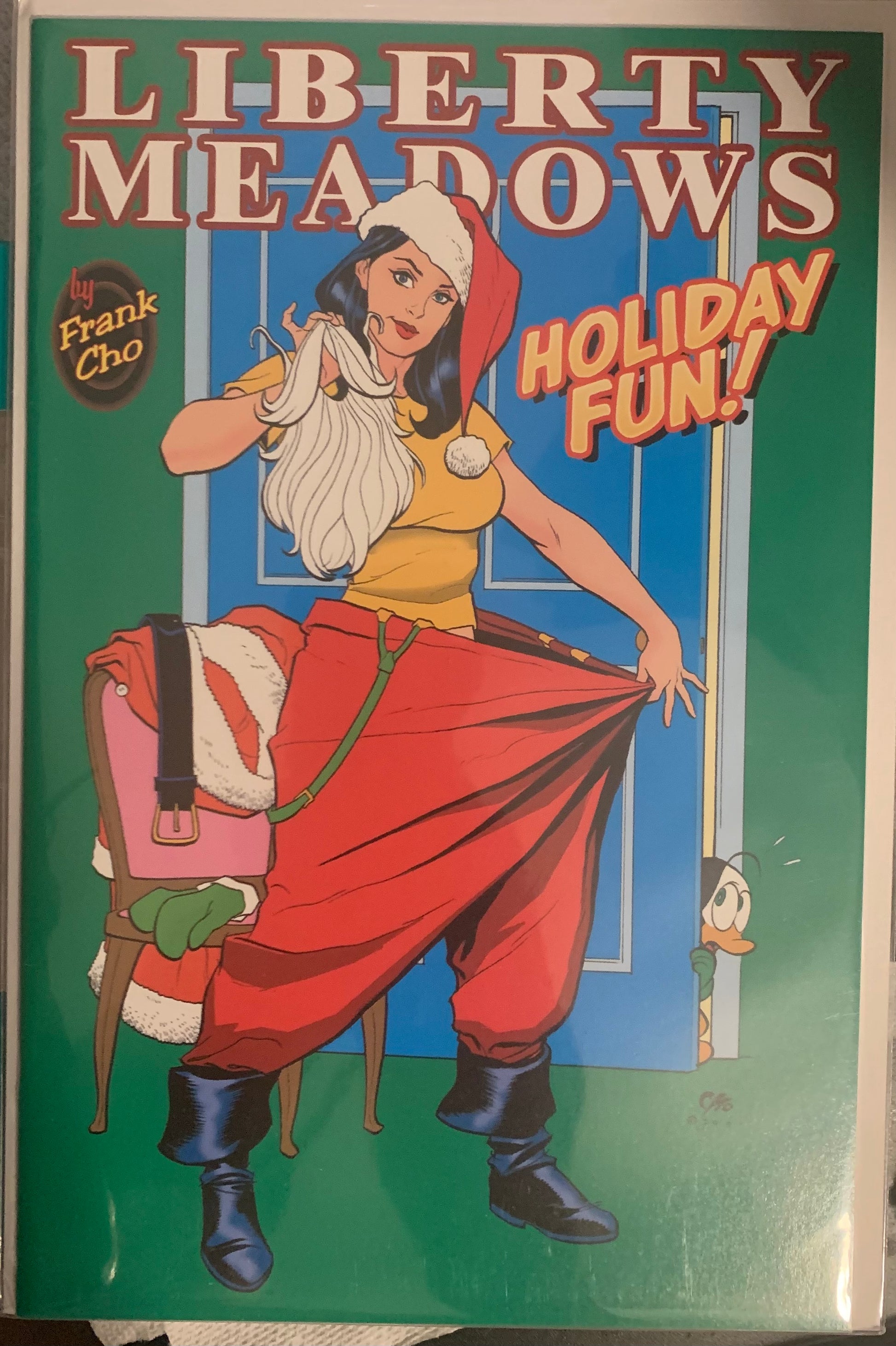 Comic book cover titled 'Liberty Meadows Holiday Fun!' with a character in a Santa outfit.