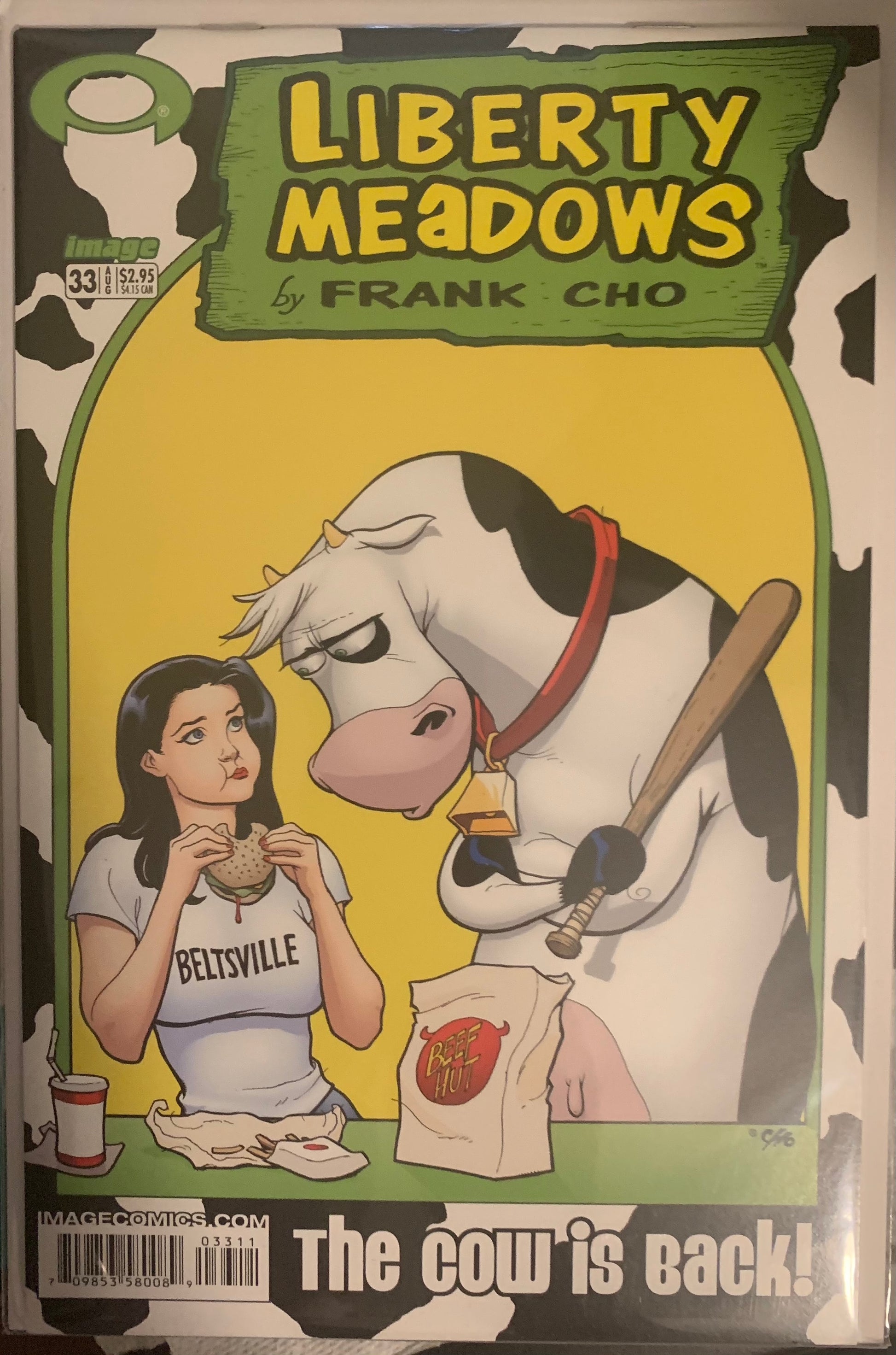 Comic book cover of 'Liberty Meadows' featuring a cow and a person with text 'The cow is back!'.