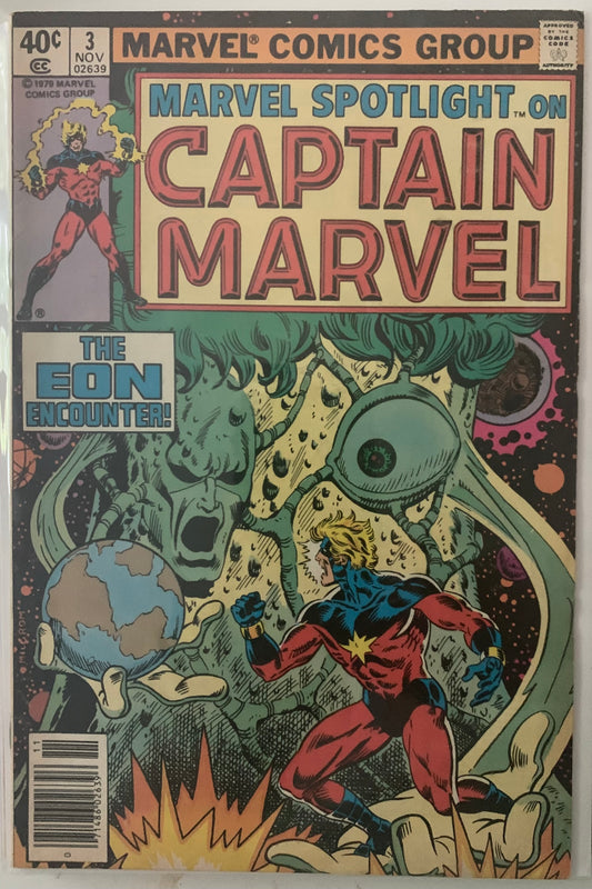 Vintage Comic book cover featuring Captain Marvel with a green alien creature and text 'Marvel Spotlight on Captain Marvel'. The Eon Encounter!