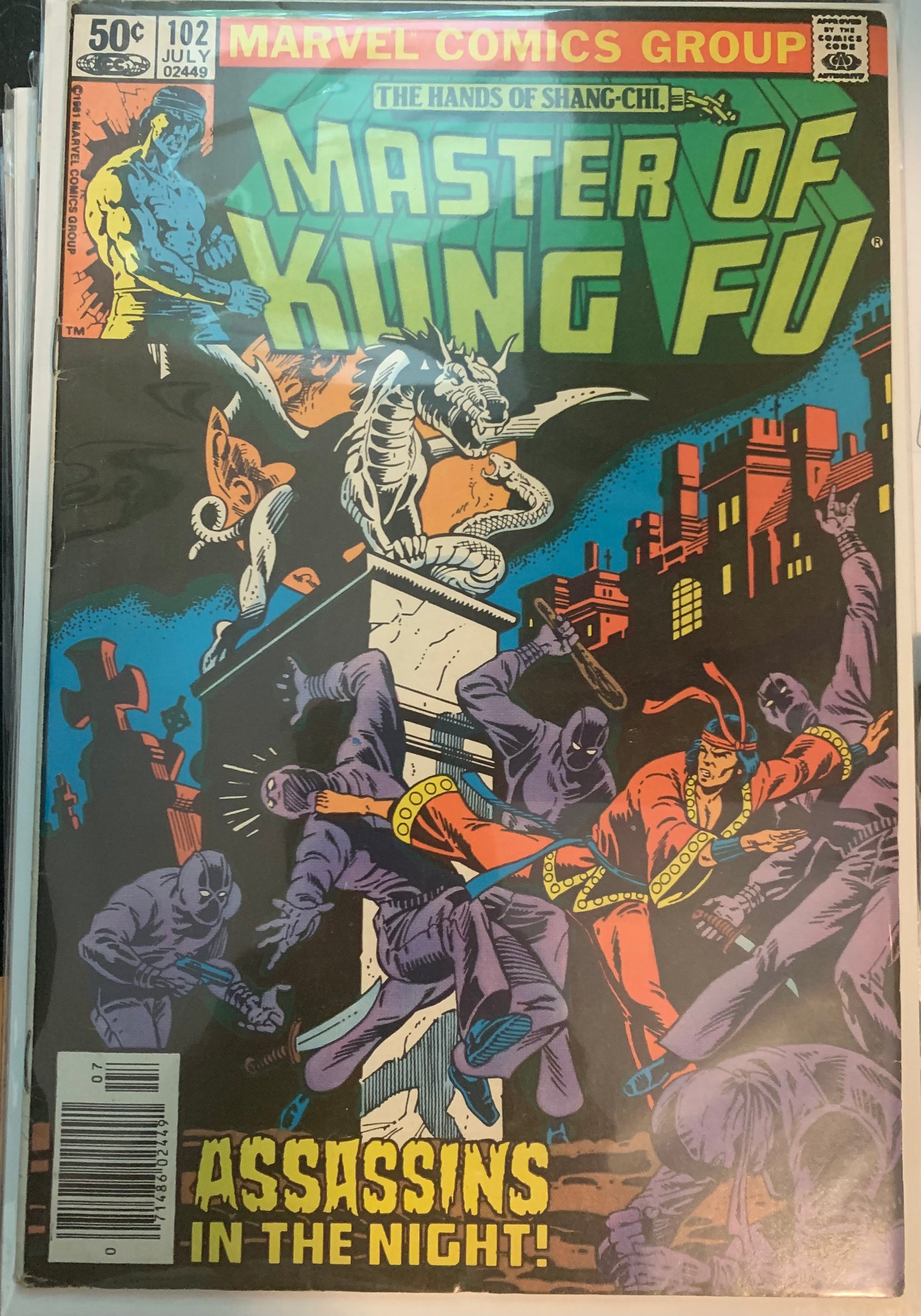 Vintage Comic book cover of 'Master of Kung Fu' featuring martial arts action and a dragon statue. Assassins in the Night!