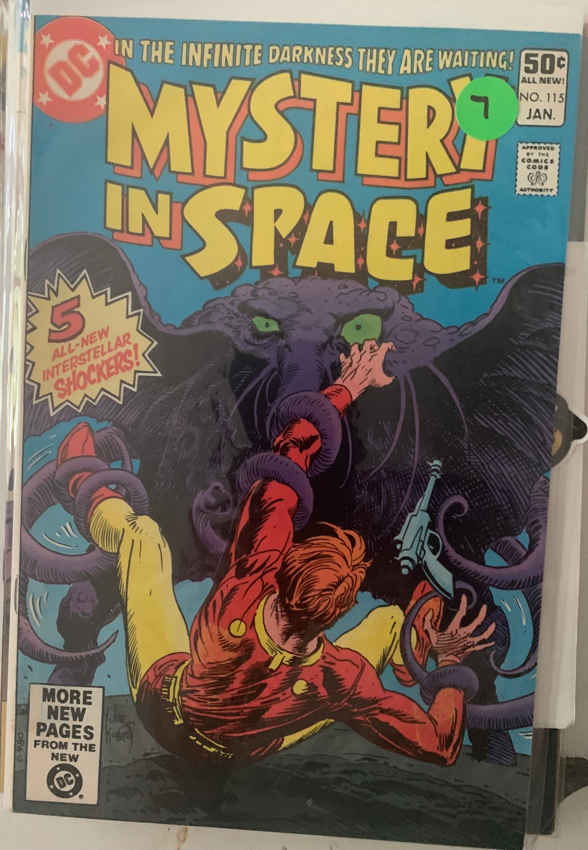 Vintage Comic book cover titled 'Mystery in Space' with a creature attacking a person in a red and yellow suit.
