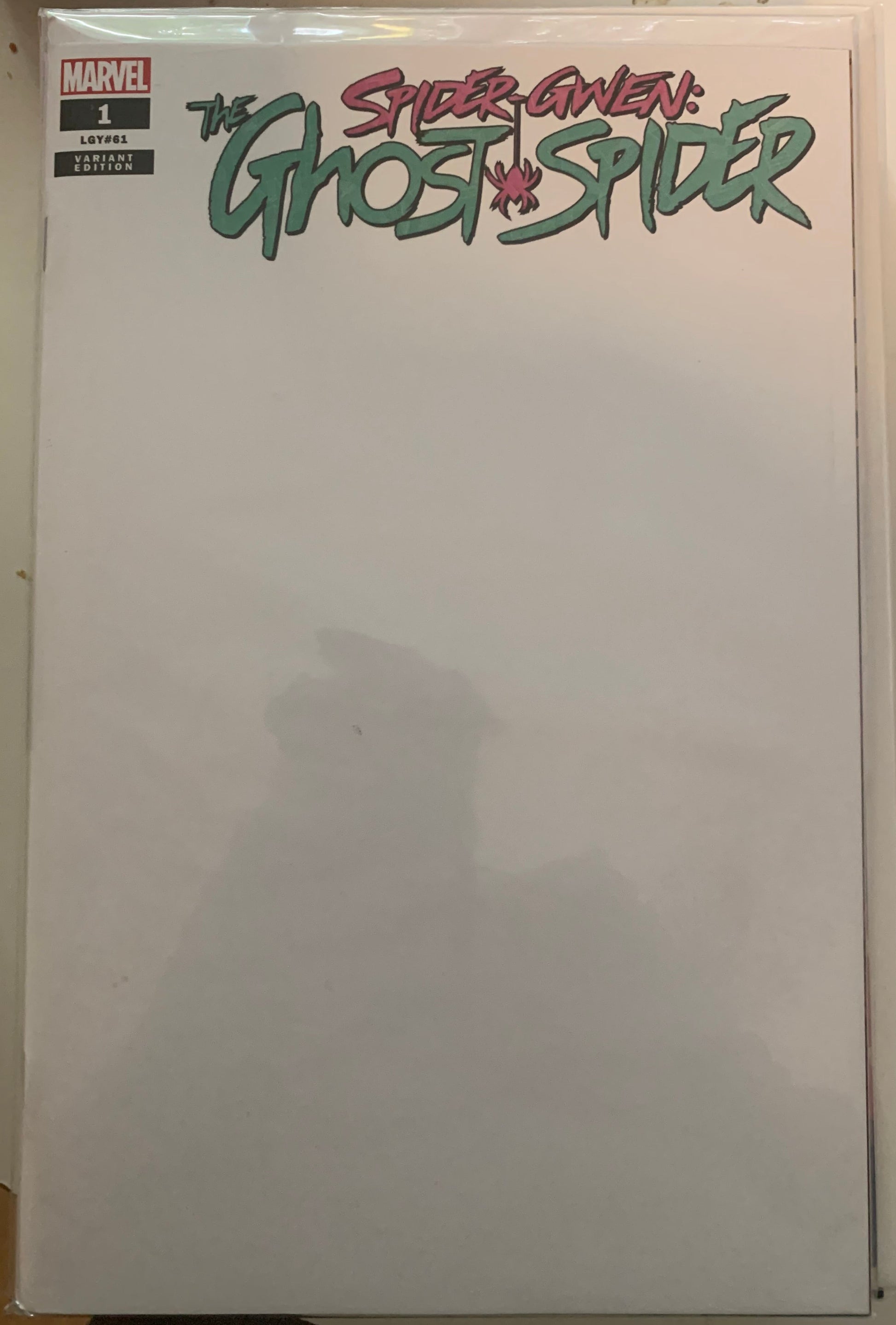 Comic book cover titled 'Ghost Spider' with colorful title on a blank, white background