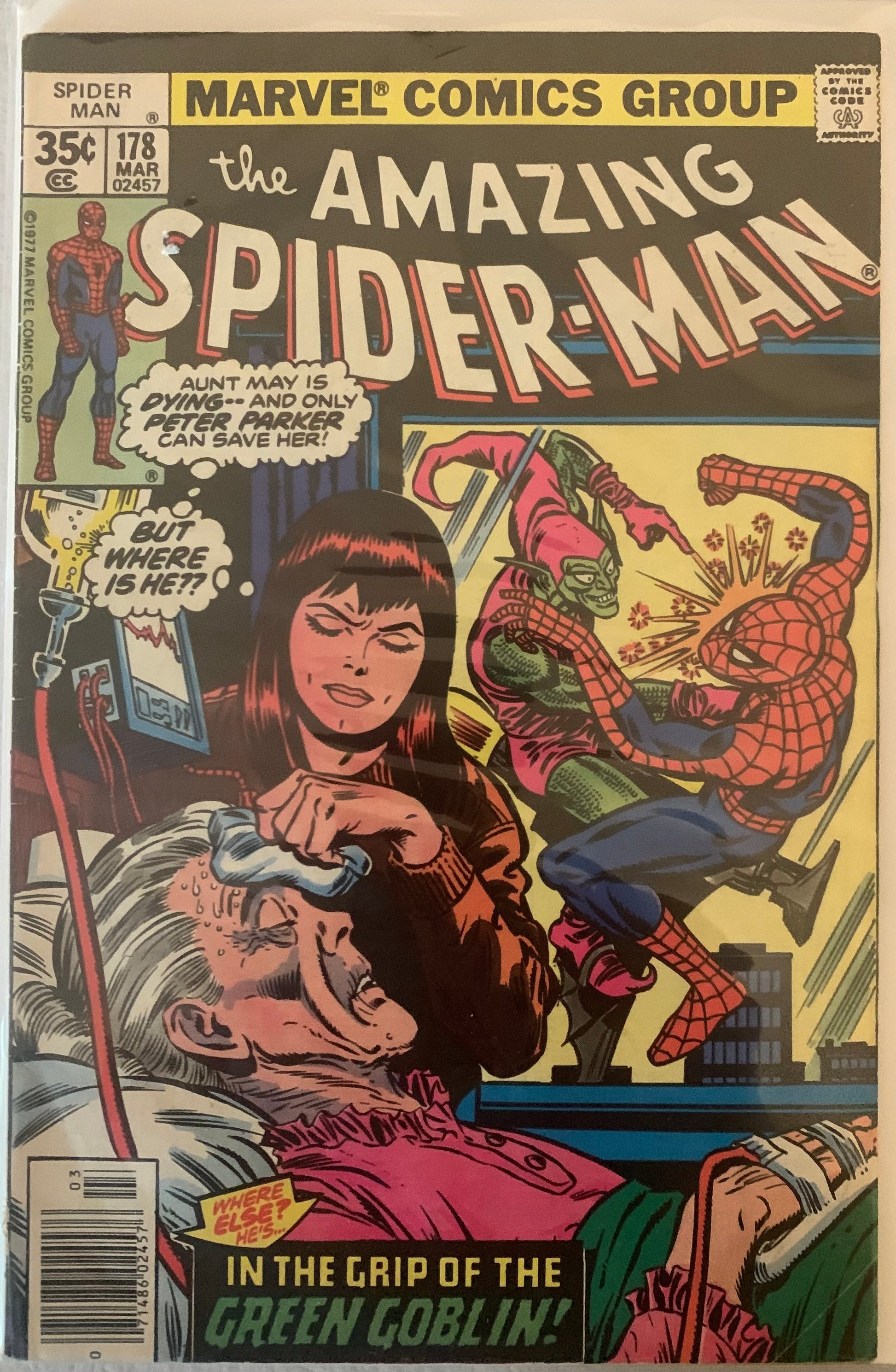 Vintage Comic book cover featuring Spider-Man and MJ with Aunt May, and a battle with the Green Goblin.