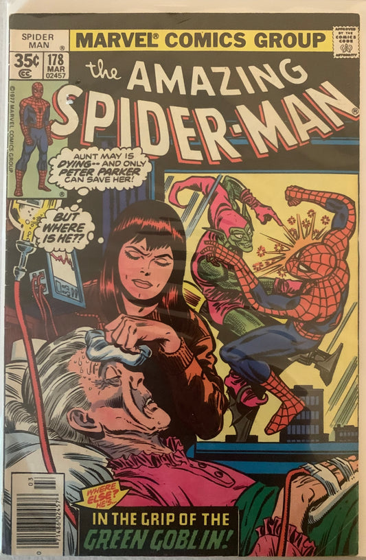 Vintage Comic book cover featuring Spider-Man and MJ with Aunt May, and a battle with the Green Goblin.