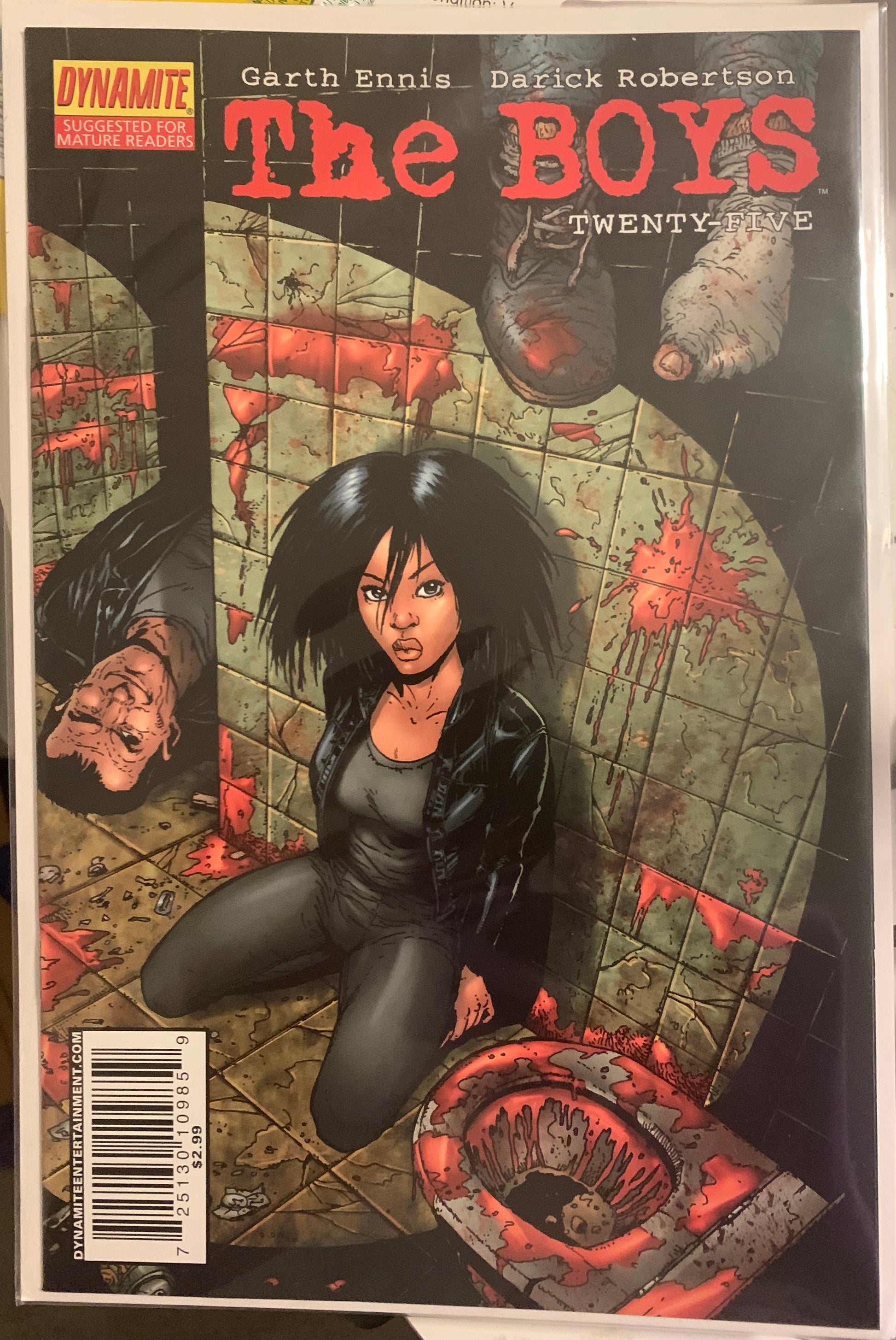 Comic book cover of 'The Boys' with a character in a dark outfit surrounded by blood on the walls and toilet.