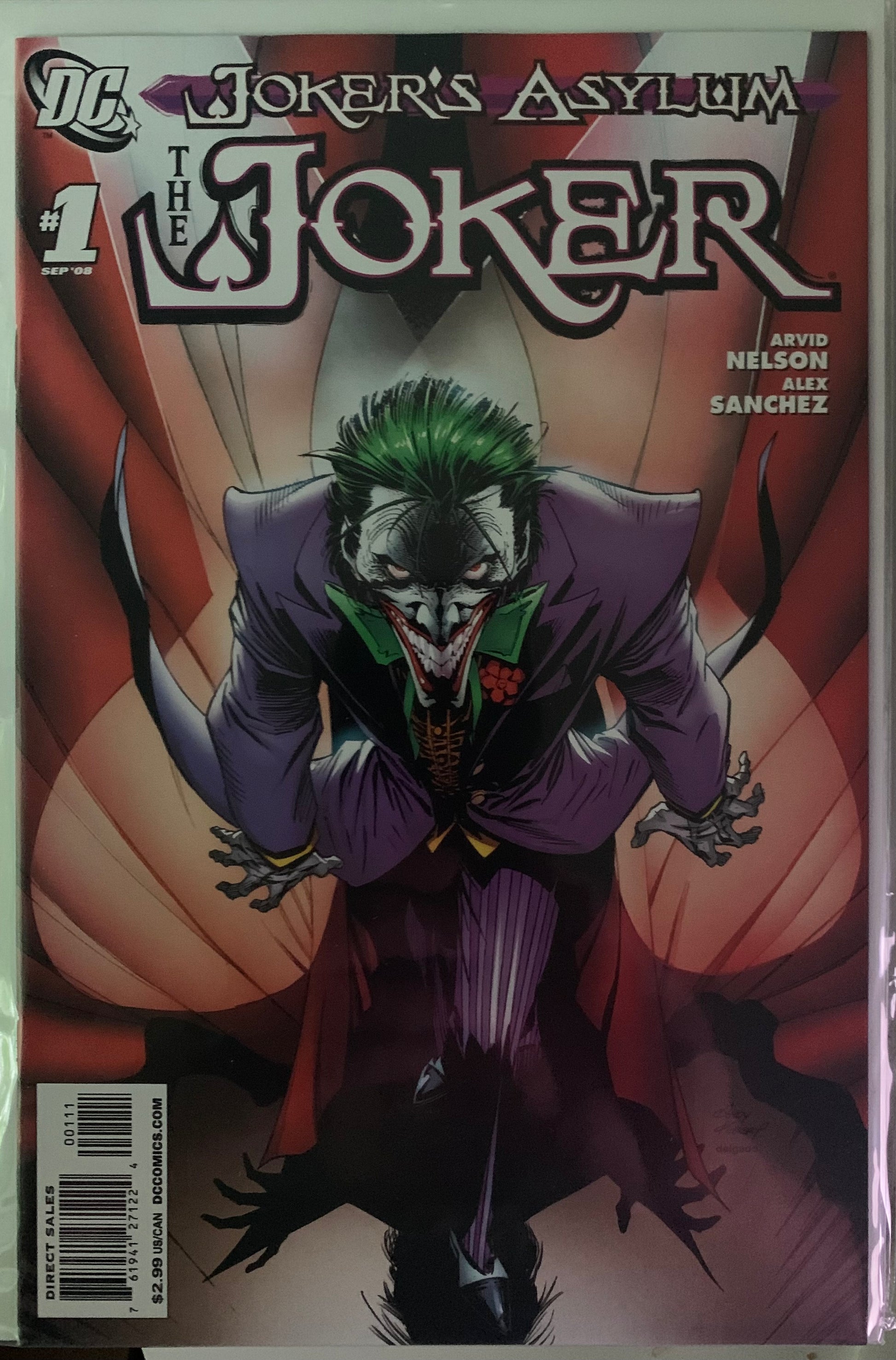 Comic book cover of 'The Joker' from 'Joker's Asylum' series with green hair and purple suit.