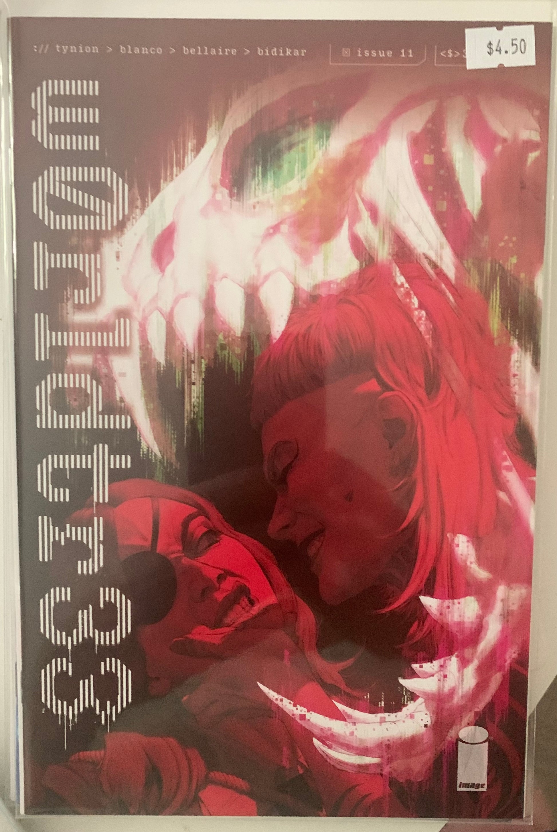 Comic book cover with a dramatic scene of a woman with an eye patch and a grinning creature.