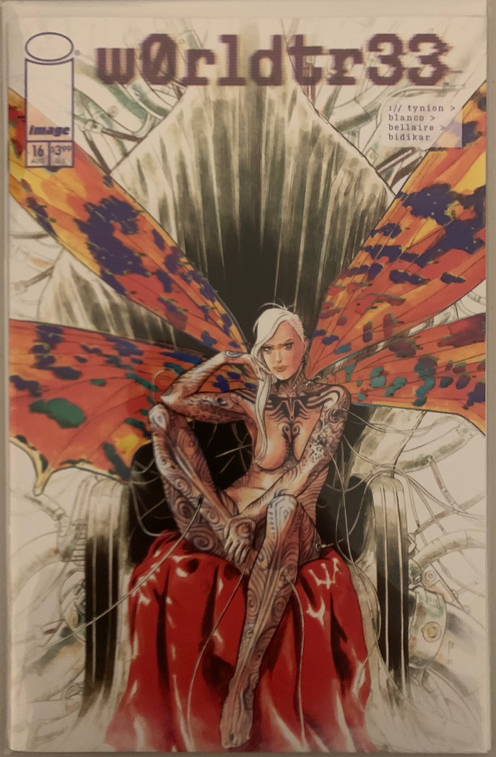 Comic book cover with a stylized heavily tattooed, nude, human figure with dragonfly wings, featuring the text 'w0rldtr33'.