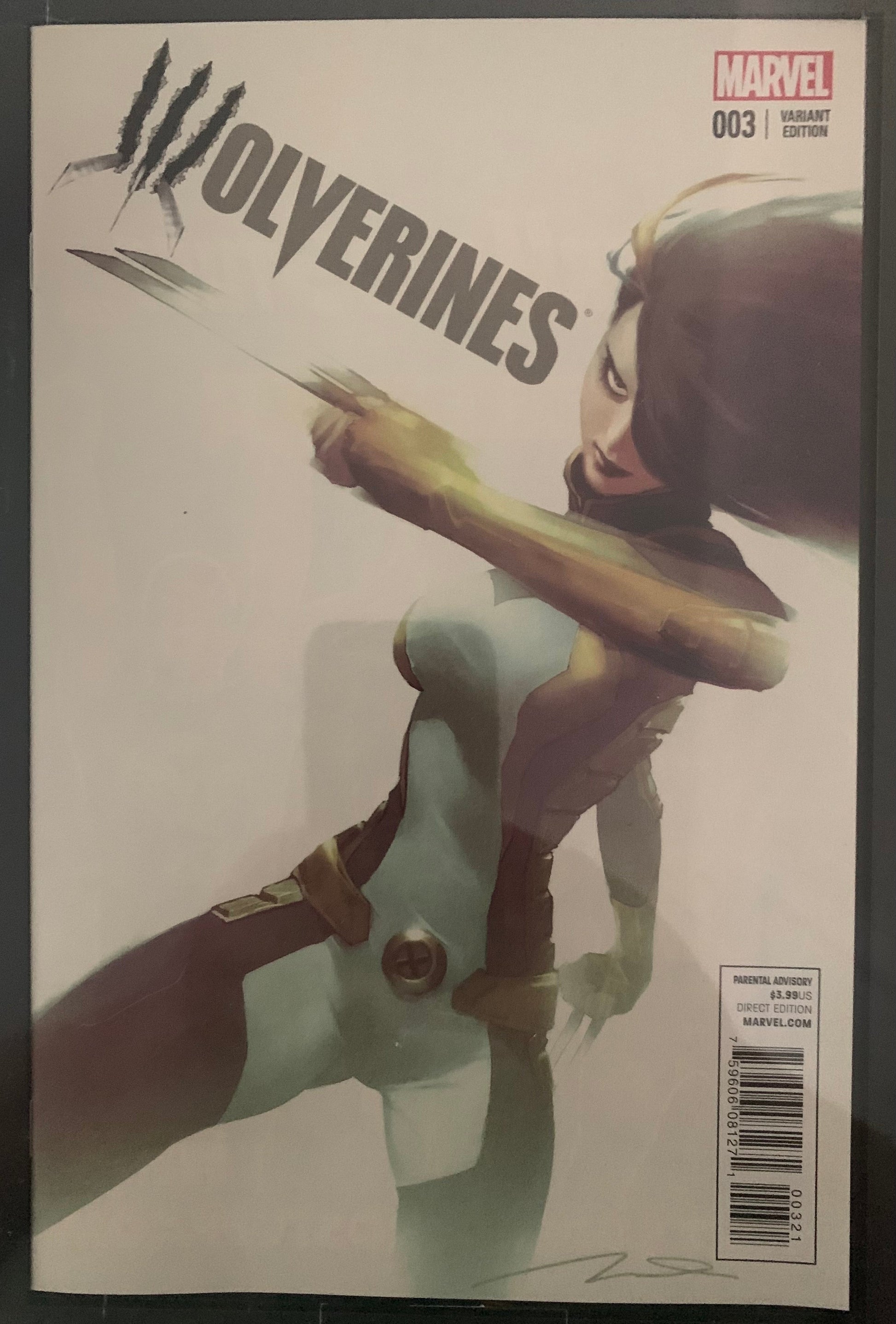 Comic book cover featuring X-23 with 'Wolverines' title and Marvel logo.
