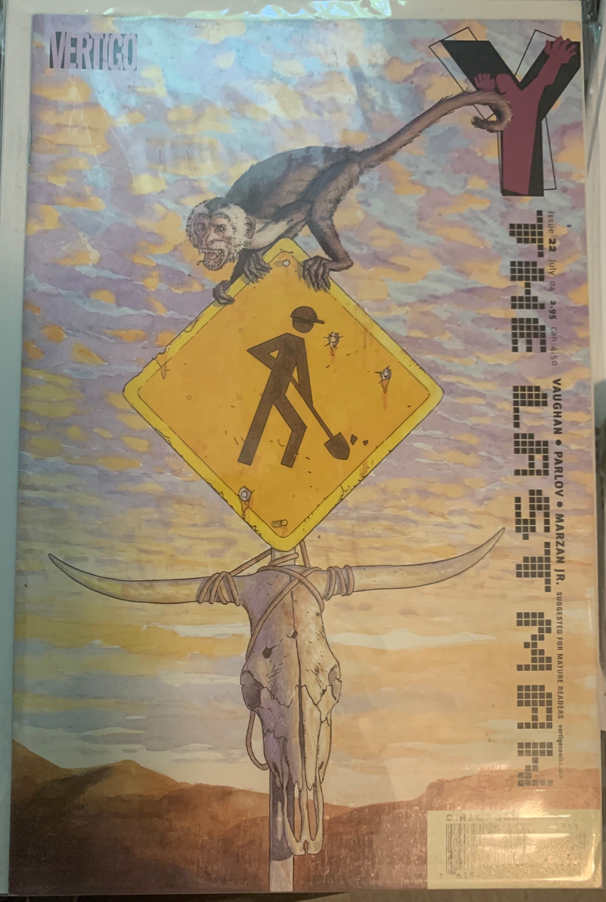 Comic Book cover with a stylized illustration of a monkey on a sign, a cow skull, and desert landscape.