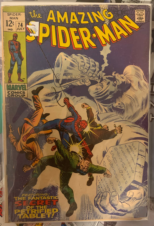 Comic book cover featuring Spider-Man and a large creature, with text and Marvel logo.