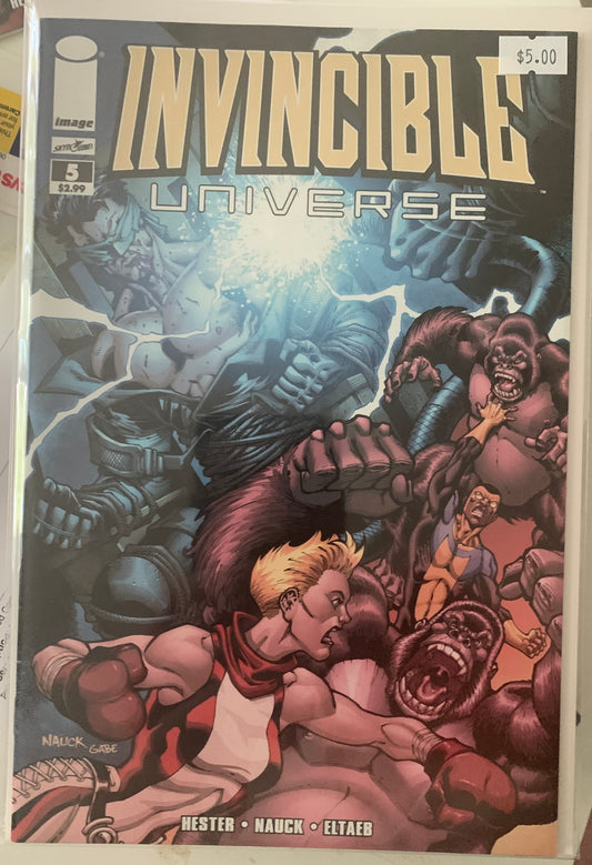 Comic book cover titled 'Invincible Universe' with super heroes fighting Apes.