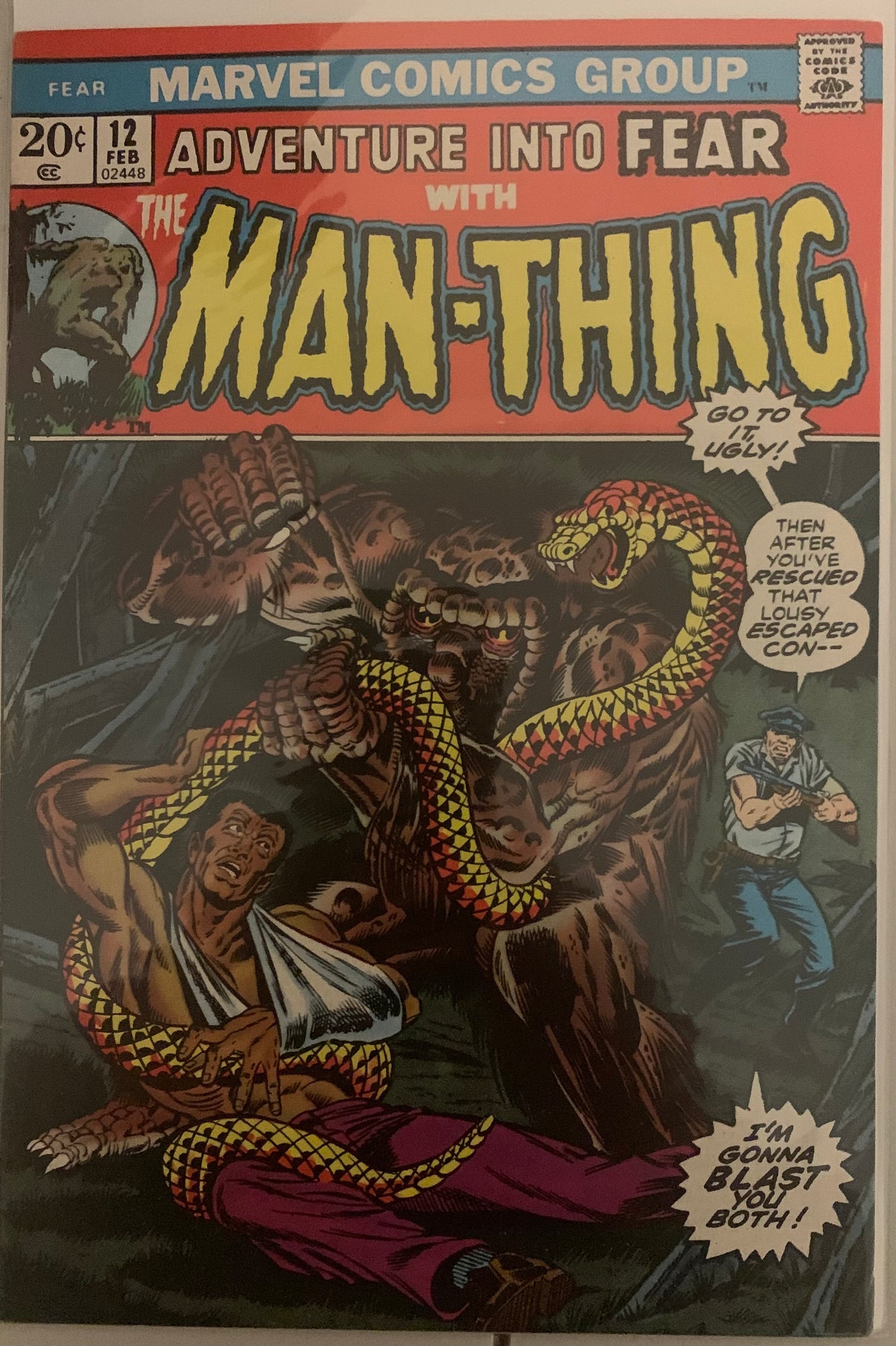 Vintage Comic book cover featuring 'Man-Thing' with snake-like creature and a corrupt law enforcement officer.