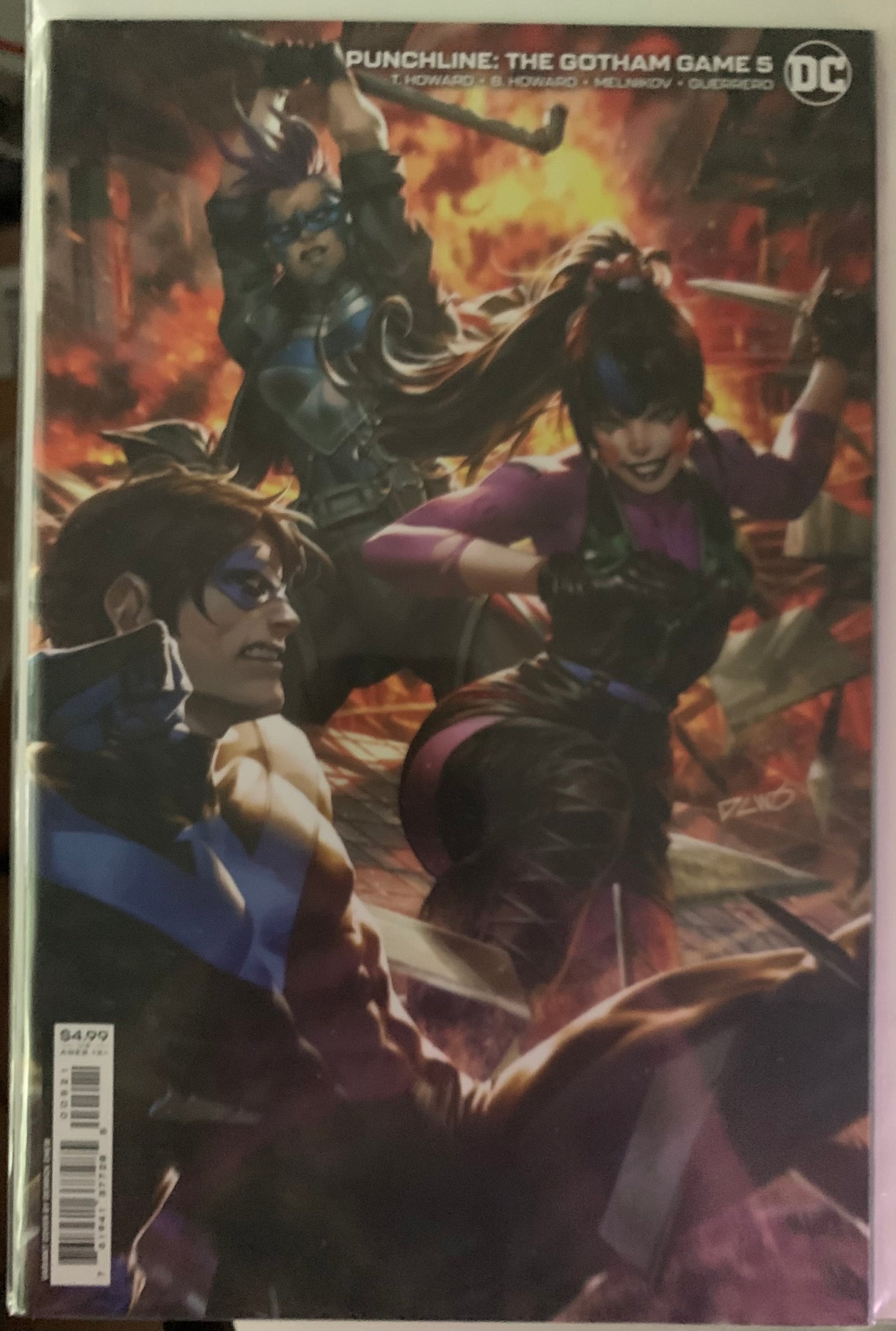 Comic book cover featuring two characters in a dynamic pose with a fiery background.